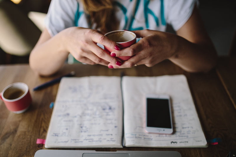 business, caucasian, hand, working, midsection, macbook, holding, one person, people, female, table, creativity, woman, cafe, sitting, lifestyles, coffee Cup