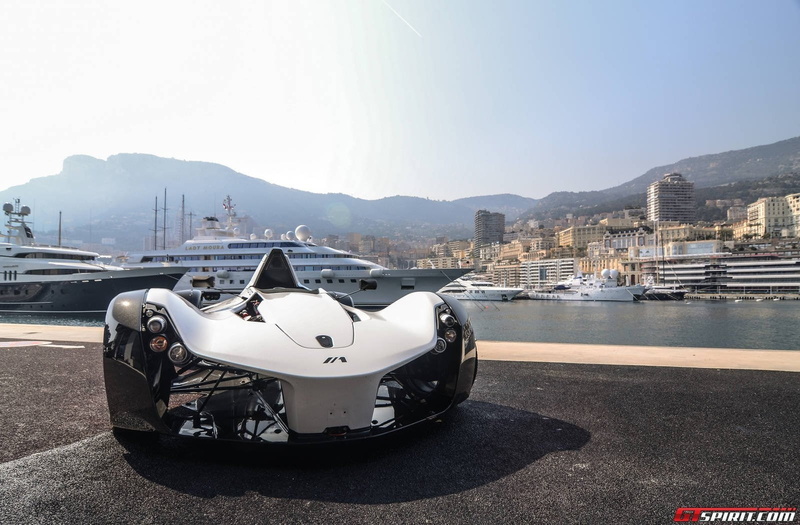 nature, city, no people, outdoors, bac mono, built structure, road, clear sky, land vehicle, day, mountain, transportation, sky, building exterior, mountain range