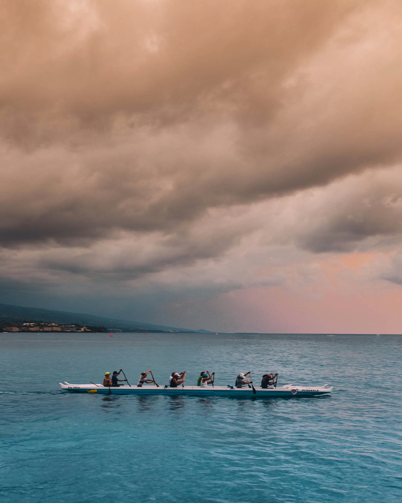 outdoors, daytime, sport, teamwork, cooperation, mode of transportation, cloud, rowboat, group of people, rowing, effort, riding, horizon over water, beauty in nature