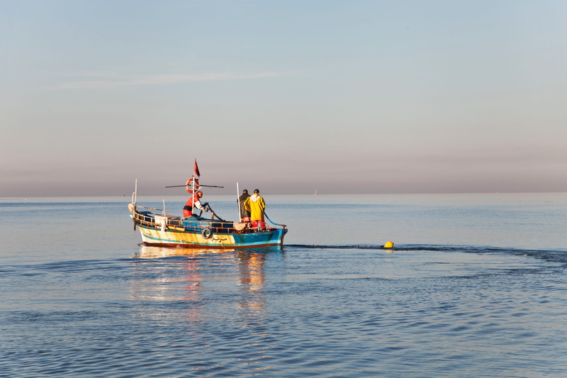 mode of transportation, travel, fishing boat, adult, motion, boat, blue, daytime, fishing industry, outdoors, fishing, vacations, holiday, horizon over water
