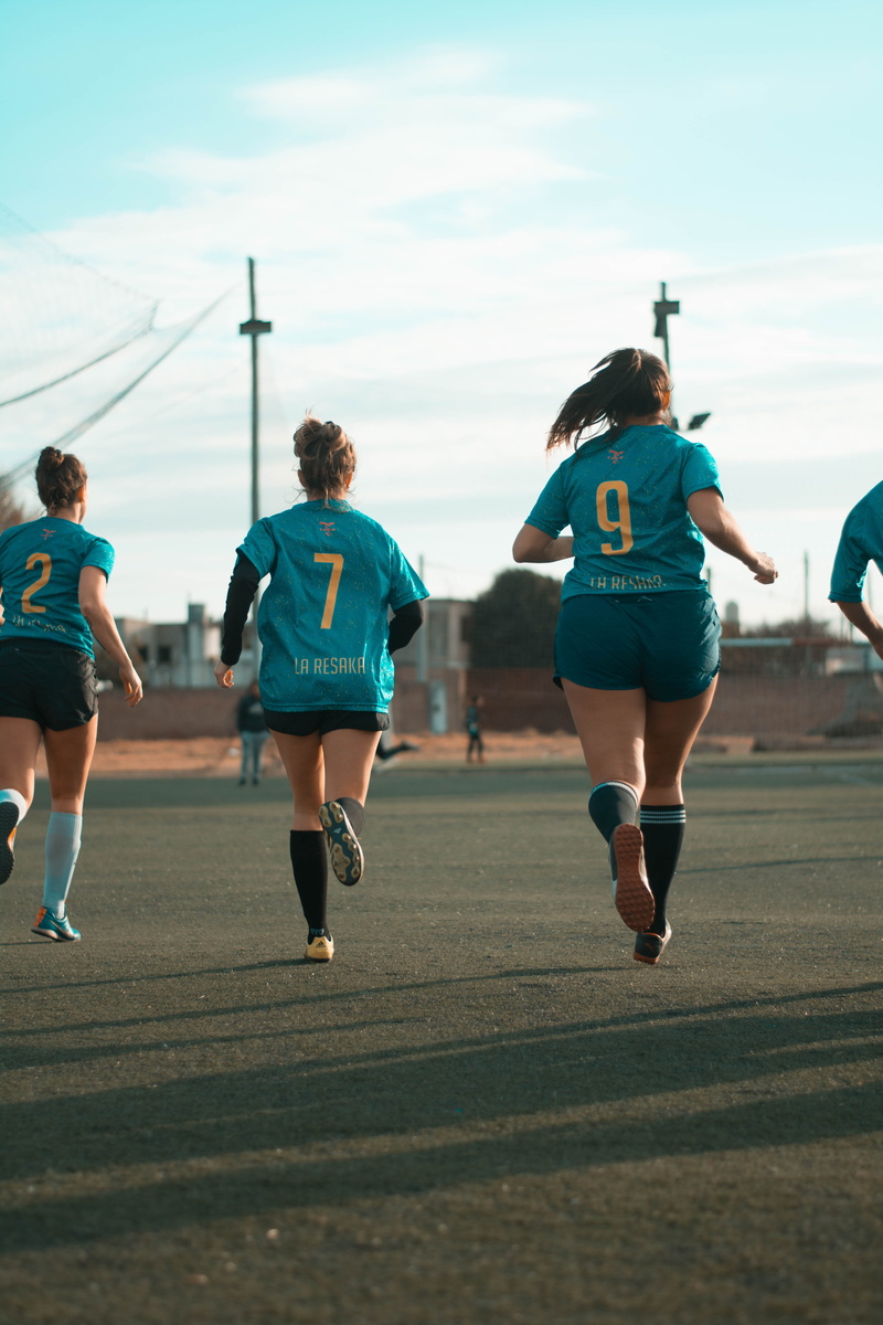 vitality, competition, running, sport, real people, leisure activity, three, track and field, incidental people, jersey, football players, sports clothing