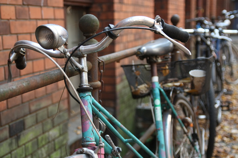 architecture, commuting, built structure, commute, building, old, day, mode of transportation, building exterior, wheel, retro, no people, urban, metal