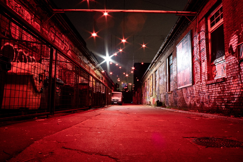 the way forward, red carpet, art, street light, absence, park, empty, urban, light, building exterior, alley, trash, illuminated, vehicle, lighting equipment