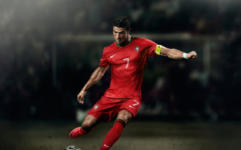 sportsman, young adult, front view, sport, focus on foreground, ballon, human arm, 2K, full length, motion, sports clothing, human limb, cristiano, effort