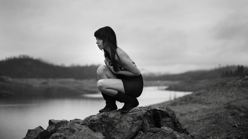 outdoors, looking at view, hairstyle, bare shoulders, one person, lifestyles, day, brunette, Breana Rich, rock, beauty in nature, young adult, young women