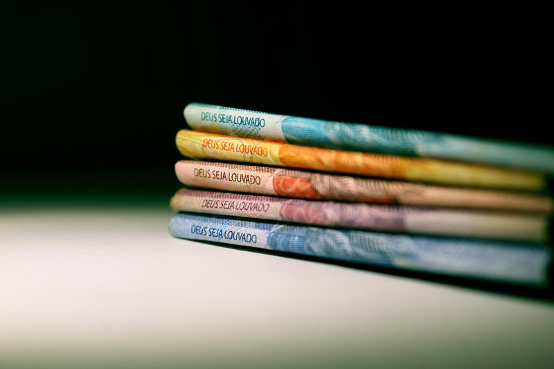 variation, faith, book, medium group of objects, god, brazilian money, indoors, copy space, communication, education, selective focus, religion, ballots
