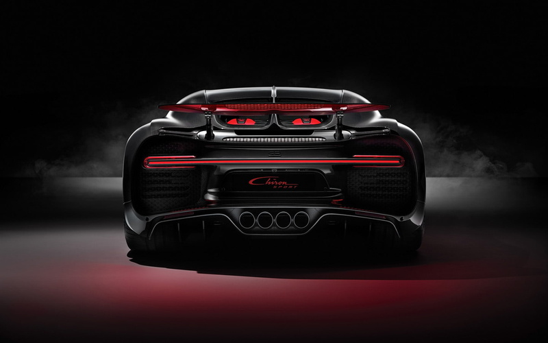 motor vehicle, supercar, black color, arts culture and entertainment, indoors, black background, no people, studio shot, car, technology, chiron, night