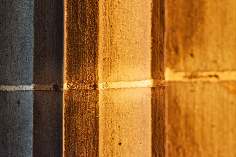 mariendom, pillar, rough, orange, outdoors, pattern, selective focus, textured, cross, 5K, close-up, architectural column, light, linz, no people, backgrounds