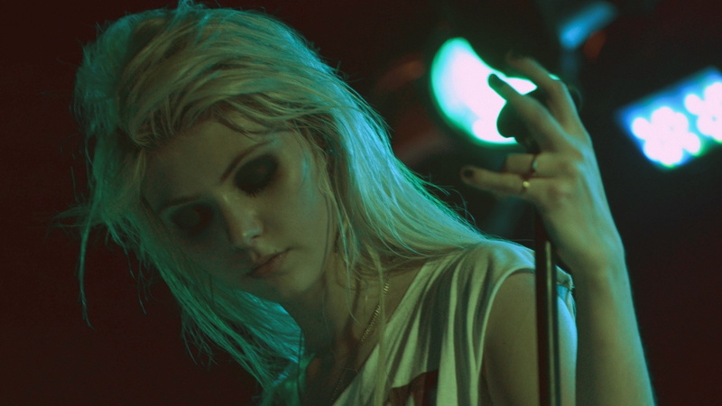 young women, long hair, night, one person, green color, nightlife, human hair, hairstyle, indoors, illuminated, headshot, young adult, blond hair, dark