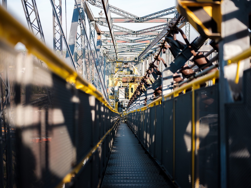 day, travel, corridor, selective focus, built structure, braunkohle, handrail, warehouse, vehicle, no people, bridge, text, yellow, metal, direction, diminishing perspective