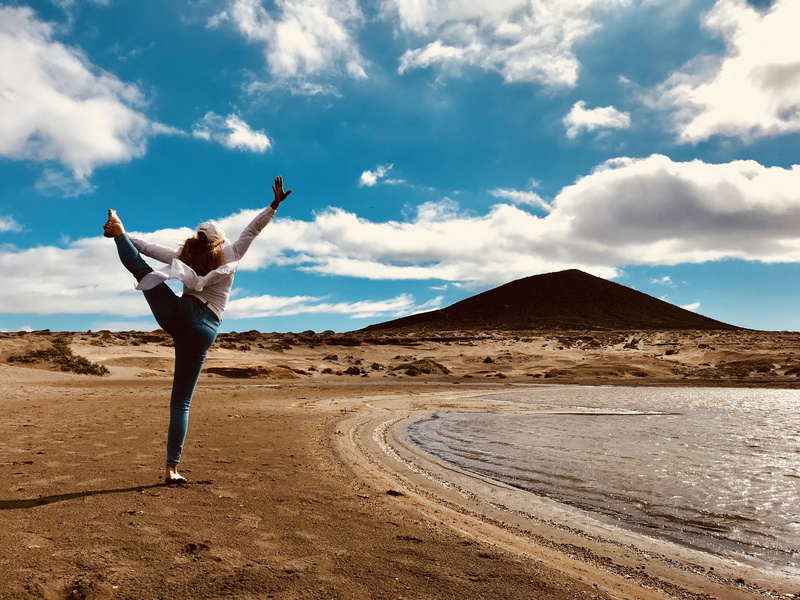 sand, day, handstand, leisure activity, sleeved, girl, legs, non-urban scene, one person, young, leg, real people, blue jeans, denim, daytime, young adult