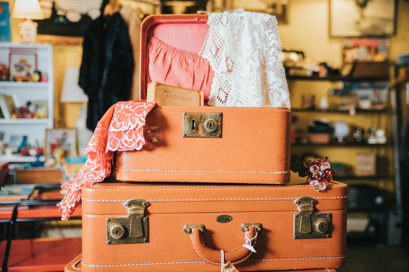 focus on foreground, person, accessory, antique, human, large, suit, hardwood, mini, box, handbag, 5K, accessories, clothing, long sleeve, case, retail display