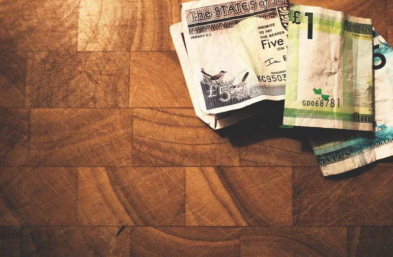 brown, human representation, money, table, representation, business, close-up, jersey, no people, finance, assorted, surface, wealth, directly above, high angle view
