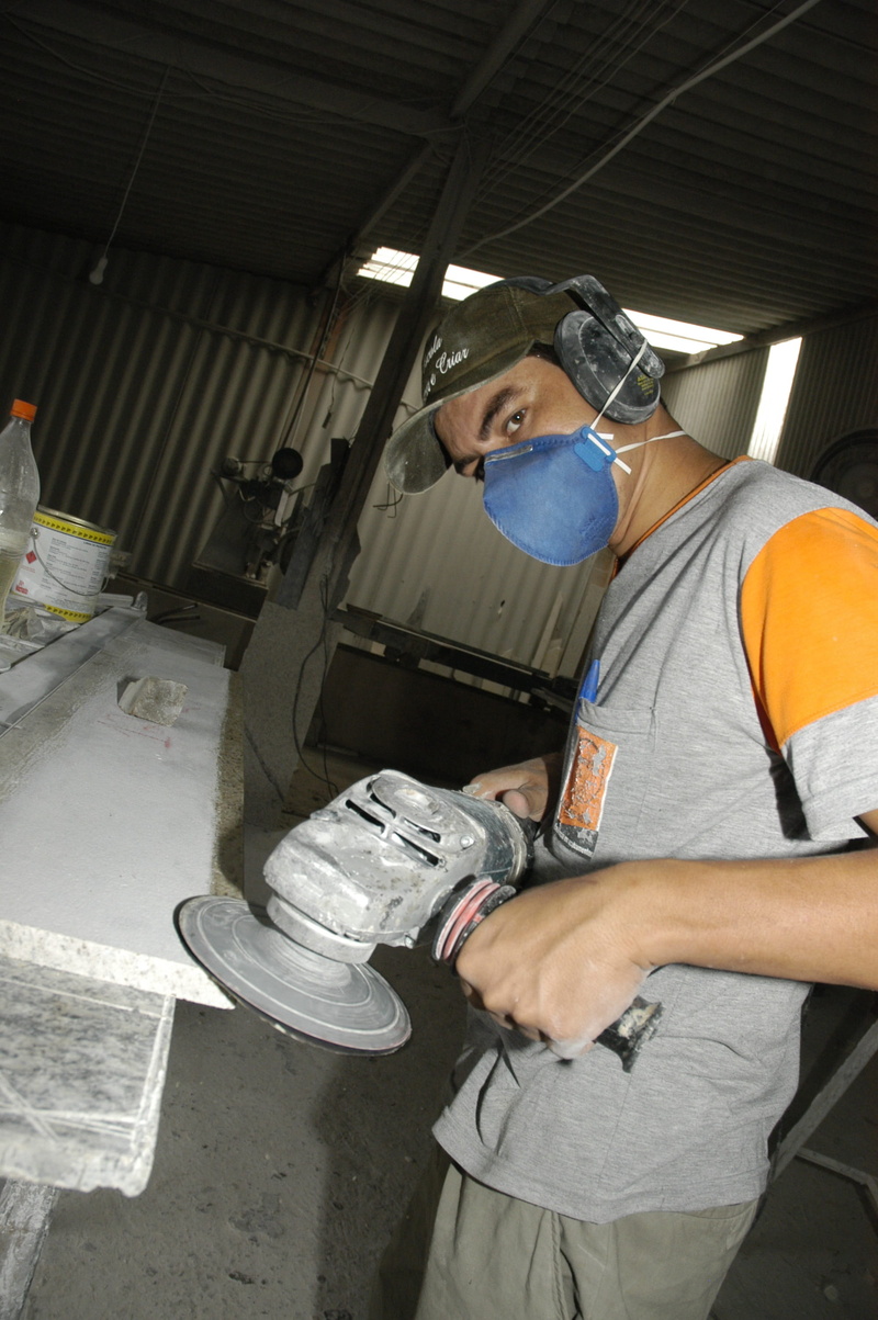 skill, marble, holding, concentration, personal protection, men, care, industry, whim, real people, security, three quarter length, one person, factory