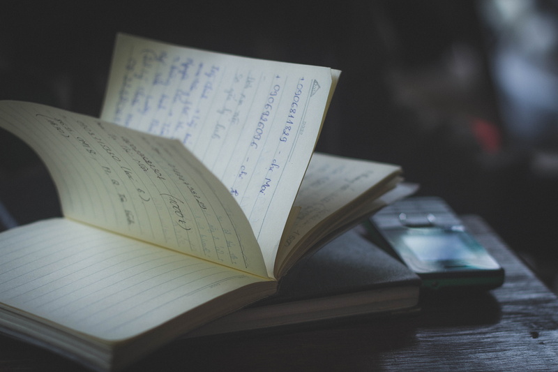 absence, document, indoors, mobile phone, focus on foreground, note, dark, literature, 5K, table, no people, learning, expertise, book, page, blur, still life