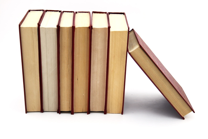 studio shot, group, rolled up, single object, words, close-up, striped, in a row, still life, library, no people, knowledge, architecture, education, text