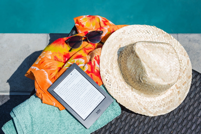 swimming pool, table, clothing, glasses, food and drink, hat, computer, relaxation, healthy eating, wireless technology, still life, holiday, outdoors