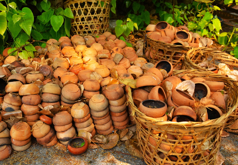 shape, outdoors, close-up, rustic, plant part, high angle view, consumerism, pile, pot, for sale, no people, 5K, utensil, bowls, pots, growth, environment