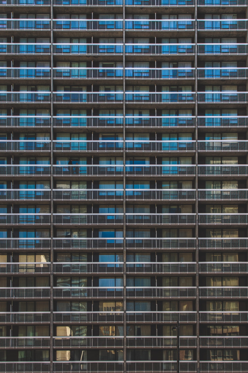 black, no people, balcony, day, architecture, gray, hotel, backgrounds, built Structure, low angle view, skyscraper, outdoors, apartment, pattern, facade