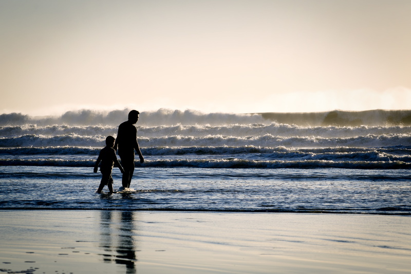 water, silhouette, child, adult, men, full length, sea, one person, body, man, land, rear view, beside, kid, swimming, walking, outdoors, ocean, people