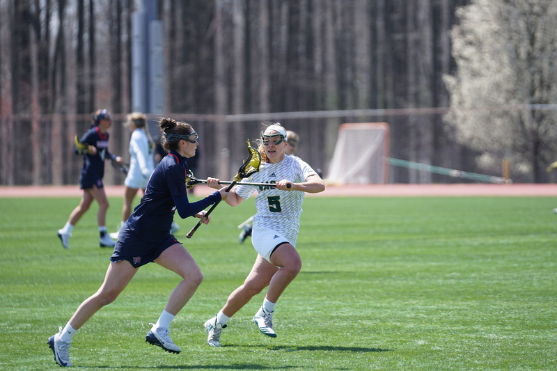 teenager, toy, person, football, real people, shorts, woman, outdoors, athlete, clothing, stick, sport, lacrosse, competition, lifestyles, adolescence
