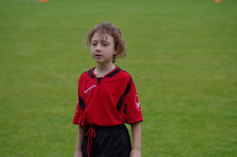 childhood, nature, sports uniform, Football, pre-adolescent child, team sport, Child, grass, one person, innocence, front view, real people, standing, hairstyle