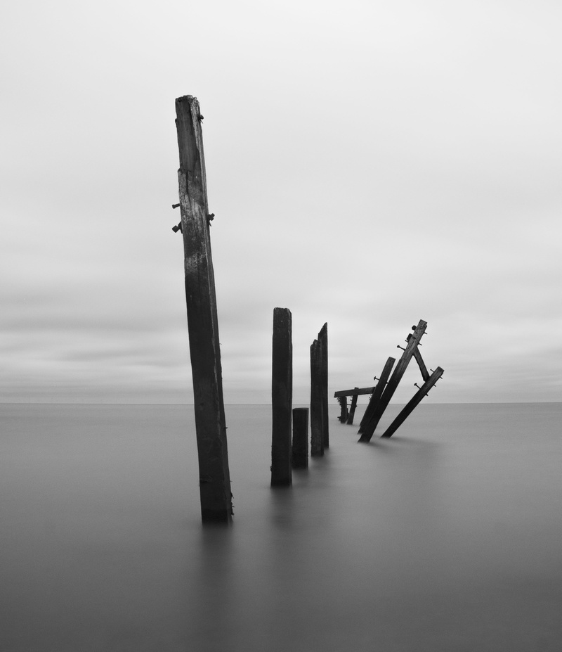water, nature, tranquil scene, broken, battered, sea, fog, no people, minimal, scenics - nature, day, grey, decay, wood - material, coastal defence, post