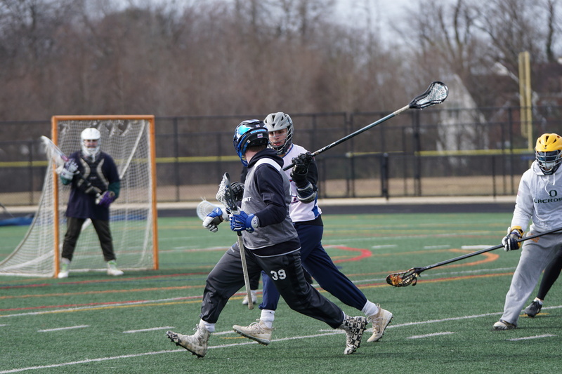 team, men, nature, lacrosse, clothing, person, teenager, stick - plant part, outdoors, activity, baseball bat, baseball, baseball glove, shoe, apparel
