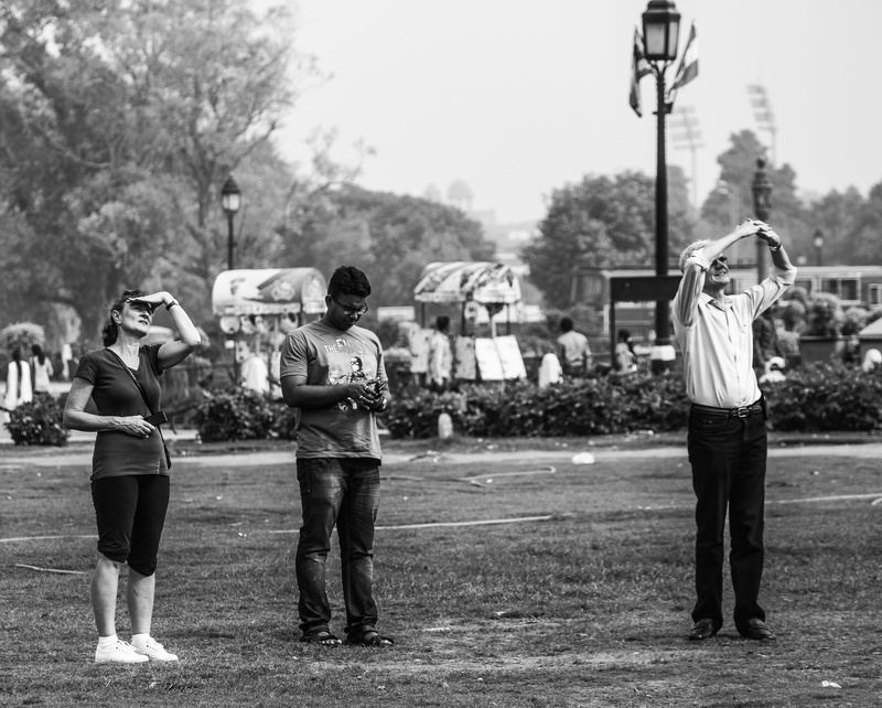 tree, human, men, togetherness, performer, architecture, casual clothing, nature, standing, built structure, day, helmet, shirt, real people, outdoors
