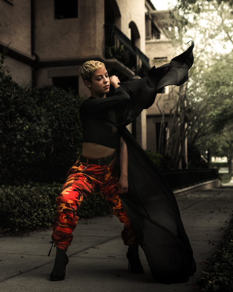 lifestyles, men, human arm, blonde, young adult, arms outstretched, wearing, 2K, street fashion, high heels, green, real people, day, fashion week, full length