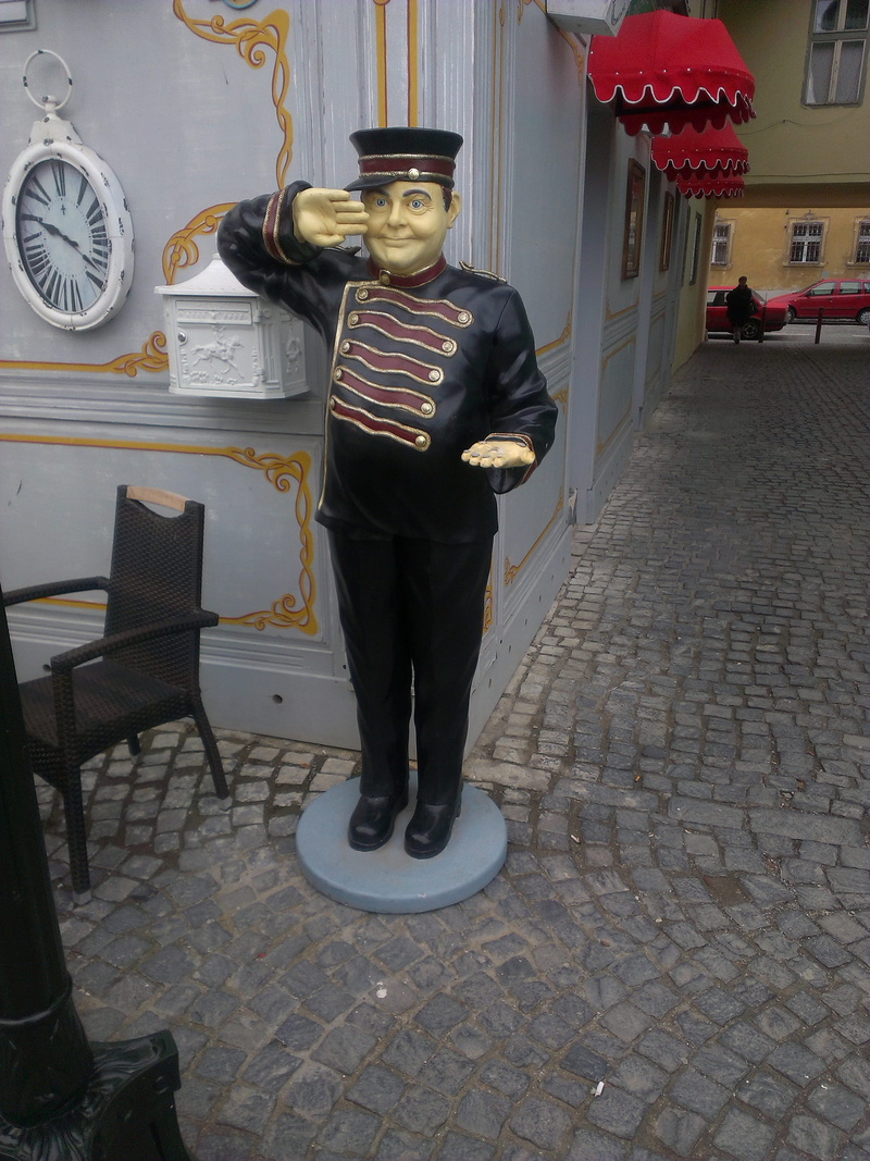 day, real people, coffee-house, males, paving stone, men, creative, human representation, tiled floor, design, casual clothing, creativity, sculpture, art