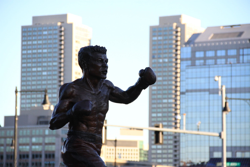 human representation, boxer, office building exterior, skyscraper, artwork, day, art, architecture, metal work, monument, creative, construction, art and craft