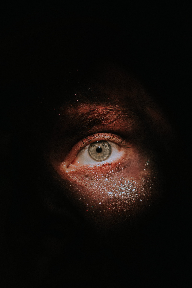 photography, dark, front view, sensory perception, macro, copy space, studio shot, close-up, shadow, focus, one person, makeup, s, looking, real people
