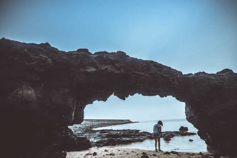dawn, sea, rock formation, beauty in nature, leisure activity, landscape, seashore, travel, nature, one person, island, holiday, men, mountain, rock, scenic