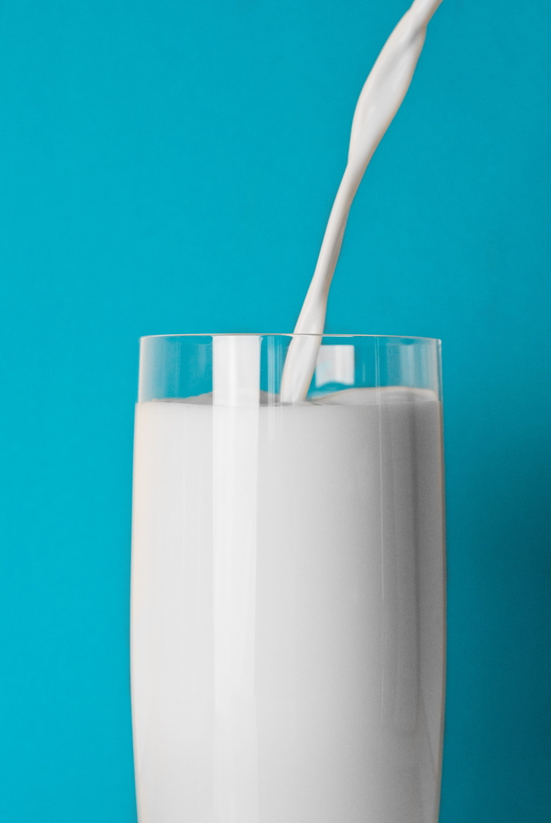 no People, refreshment, close-up, turquoise colored, drinking Glass, dairy Product, blue background, food, blue, isolated, one person, studio shot, Minimal