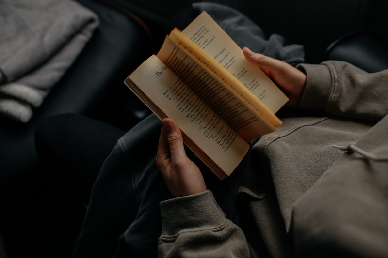 lifestyles, activity, wearing, reading, human hand, sitting, sofa, white, gray, furniture, men, literature, people, midsection, 5K, one Person, reading book