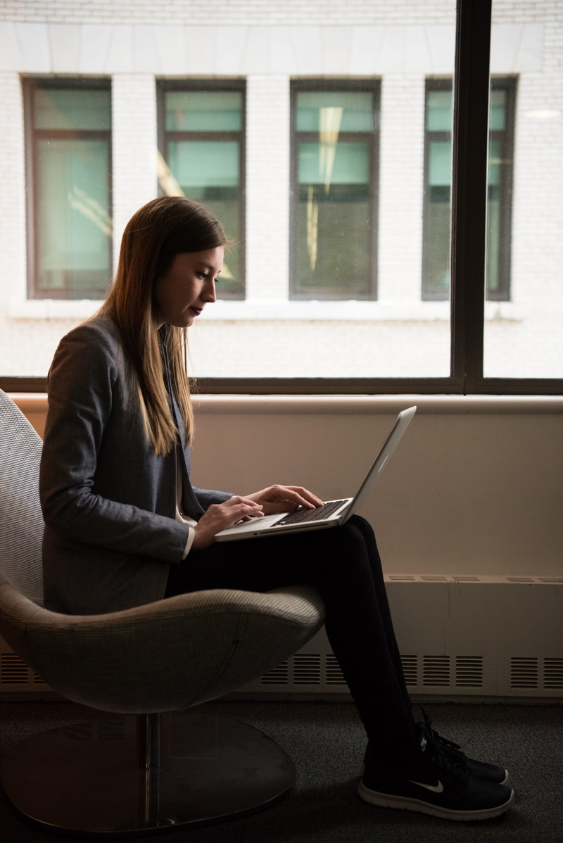 adult, girl, side view, person, internet, remote work, room, sitting, casual clothing, woman, seat, monitor, keyboard, hairstyle, window, working, young women