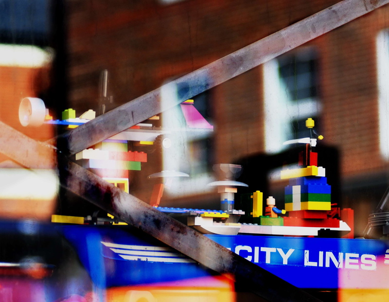 architecture, no people, multi colored, text, transportation, blurred motion, motion, lines, window, shop window, wood - material, lego, building, selective focus