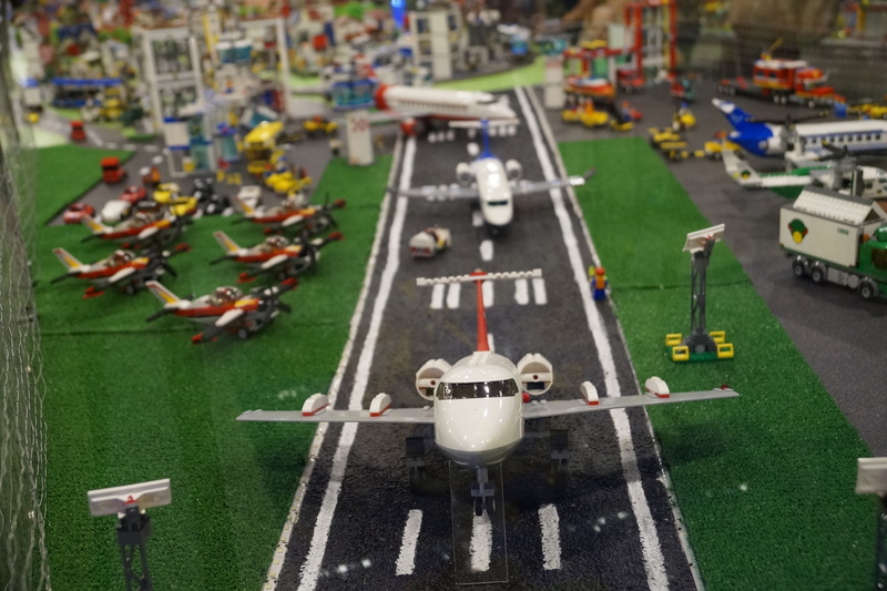 architecture, exhibition, american football - sport, competition, no people, grass, street, green color, toys, lego, lego city, figurine, focus on foreground