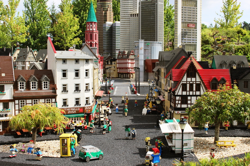 group of people, people, built structure, day, Toys, Build, standing, Lego, architecture, buildings, tree, mode of transportation, city, transportation