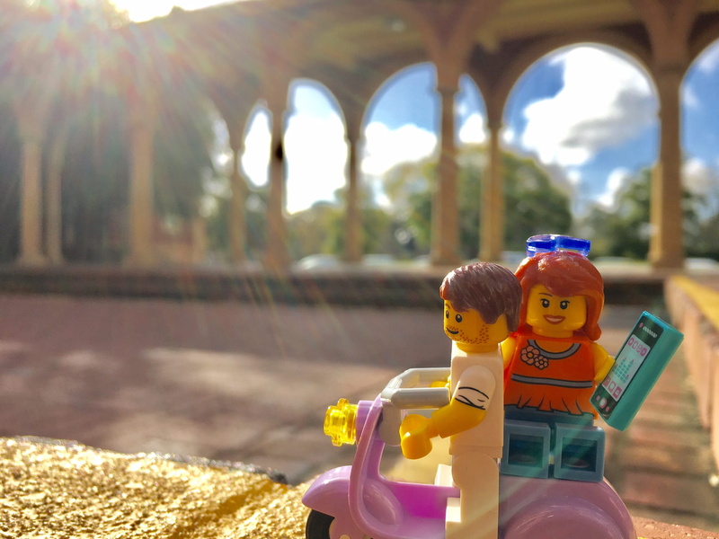outdoors, australia, day, representation, roman holiday, child, close-up, toy, men, moped, minifigures, arch, females, human representation, two people