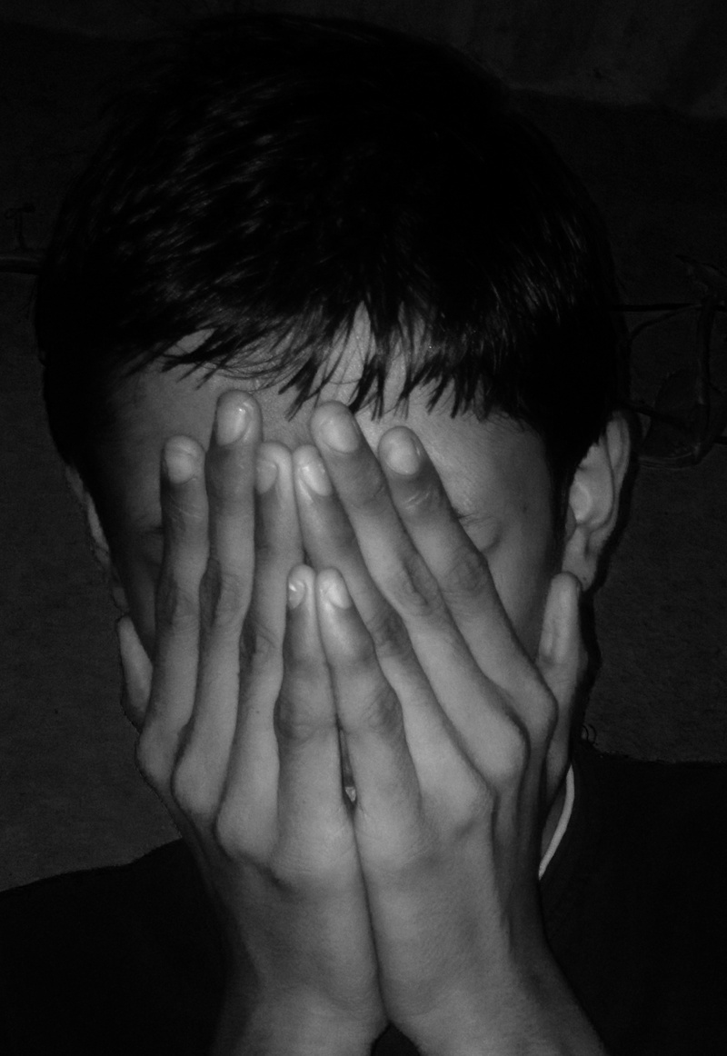 depression - Sadness, obscured face, indoors, headshot, boy, alone, fear, boys, scared, childhood, real people, expression, portrait, finger, face, hand