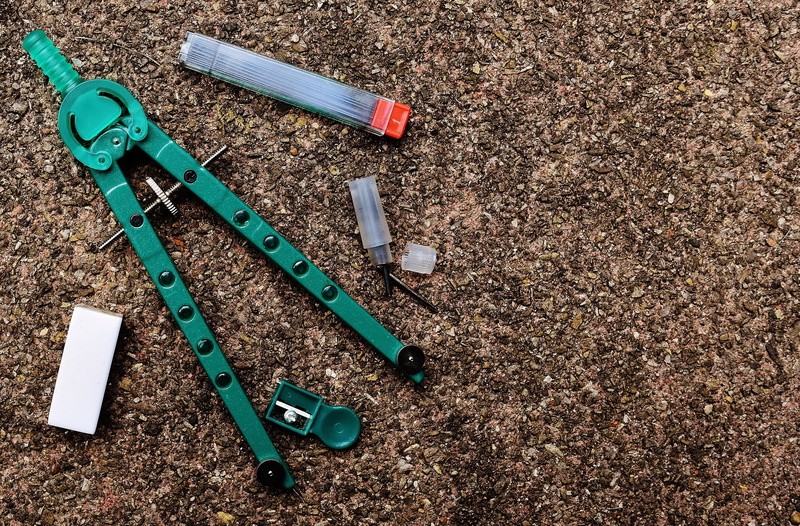 close-up, plastic, green color, desk, hand tool, office supplies, still life, field, high angle view, office accessories, work tool, metal, material, no people