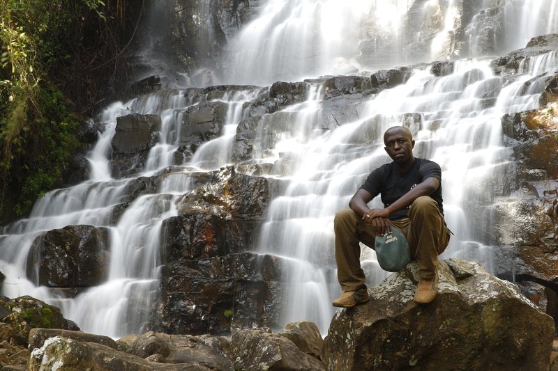 casual clothing, young men, leisure activity, travel, waterfall, solid, trip, long exposure, scenics - nature, africa, burundi, safari, environment, water