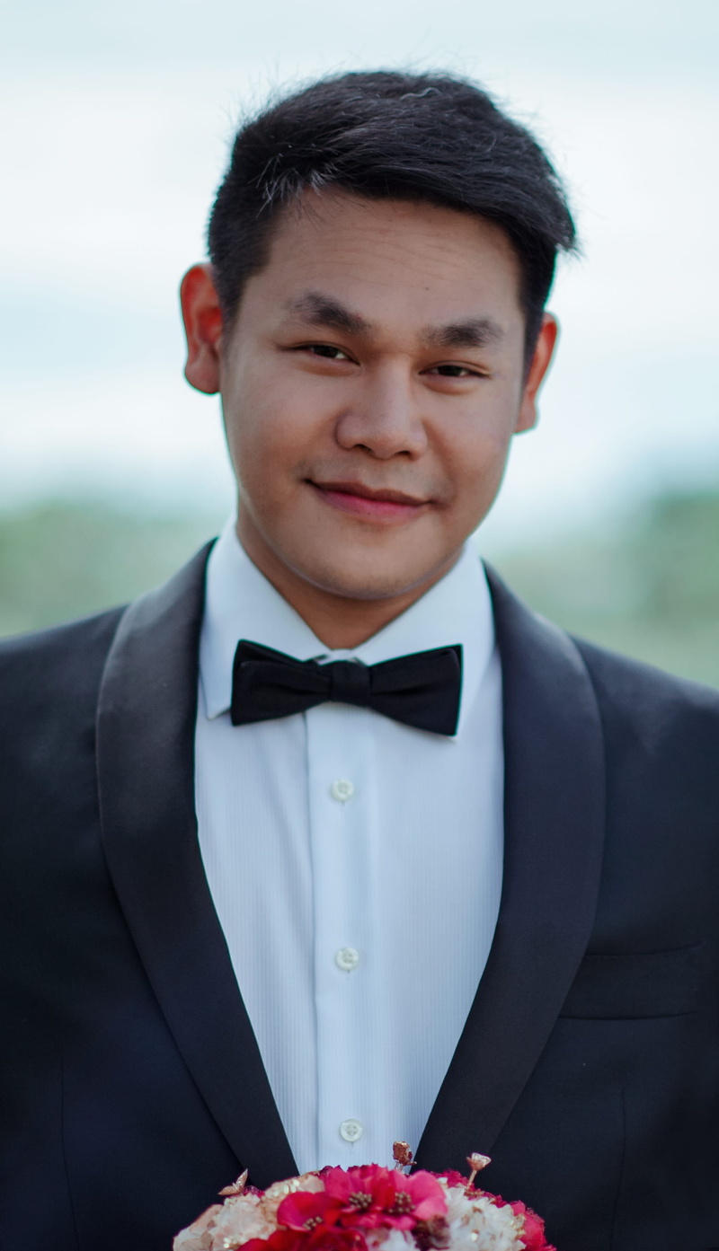suit, outfit, formal coat, front view, portrait, formal, headshot, outdoors, photoshoot, celebration, wear, emotion, guy, one person, 2K, bow tie, life events