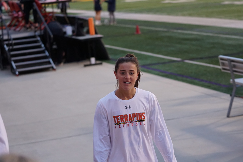 occupation, long sleeve, standing, sleeve, furniture, bench, people, looking at camera, team, responsibility, person, outdoors, uniform, front view, shirt