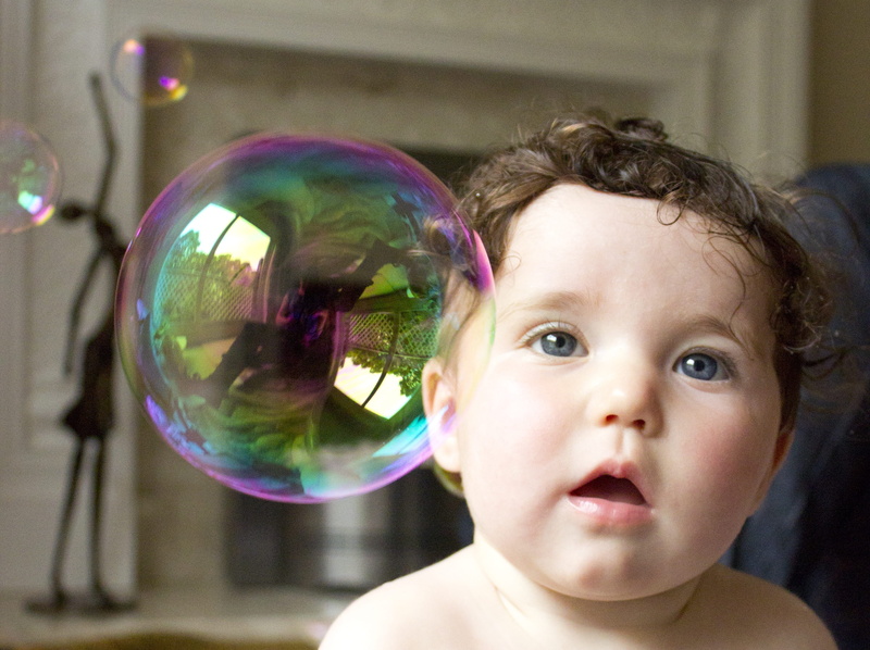 soap bubble, front view, smiling, portrait, joy, eyes, emotion, little, kid, pretty, adorable, reflection, cute, vulnerability, mouth open, discovery, 2K