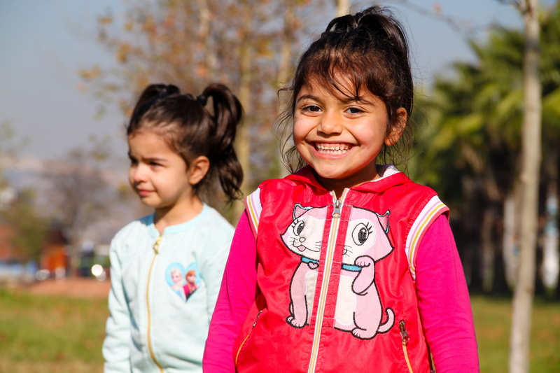 smiling girl, girl, laugh, smiley, the innocence, nature, outdoors, jacket, white jacket, childhood, white, crying girls, beautiful girl, innocence, children