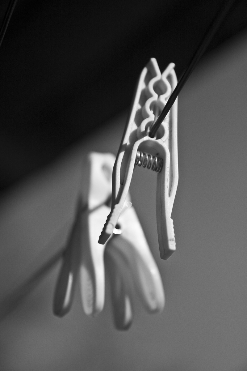 clothespin, temptation, high angle view, metal, peg, creativity, close-up, hanging, rope, single object, selective focus, fork, clothesline, text, household