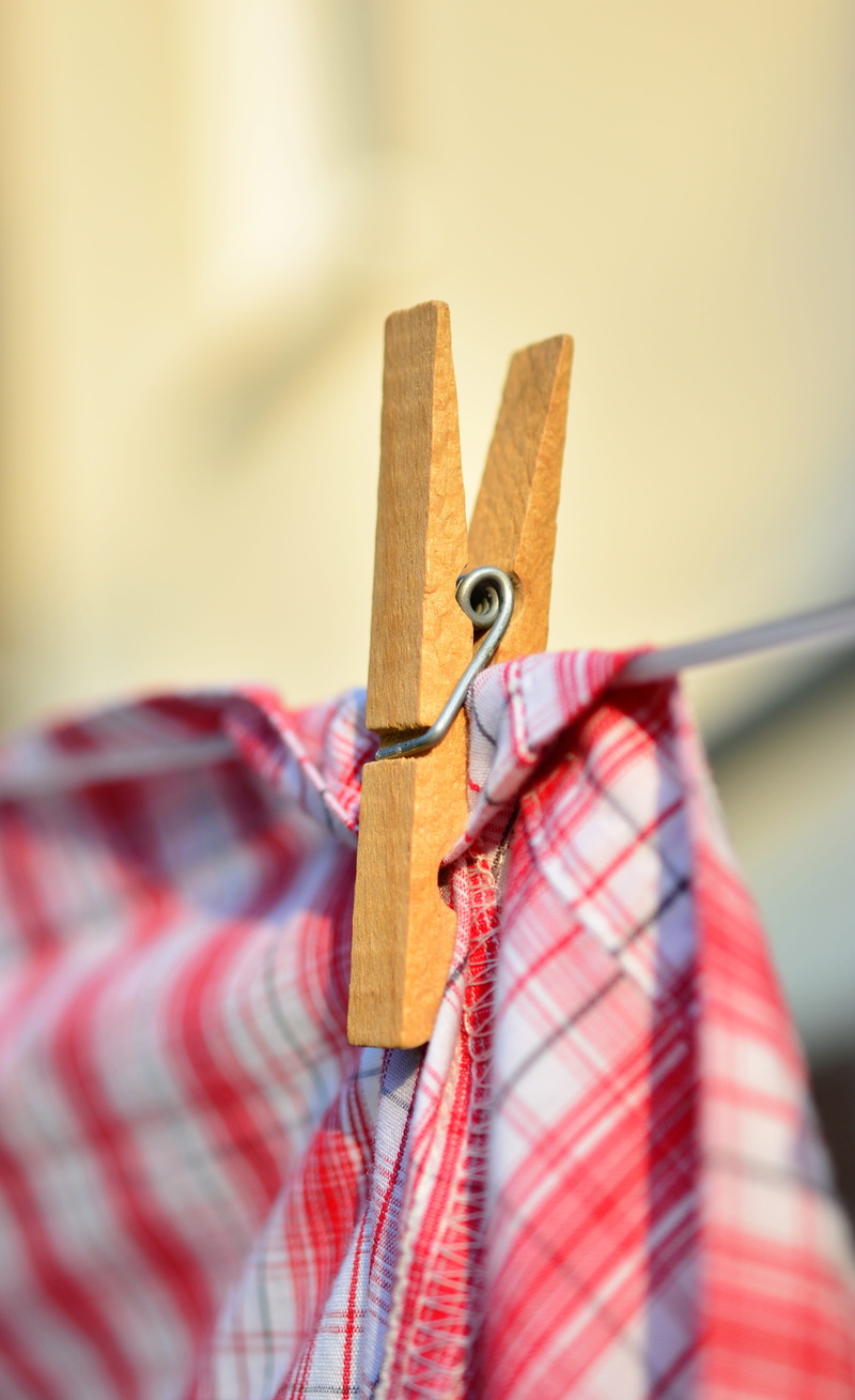 selective focus, laundry, clothes peg, rope, dry laundry, equipment, focus on foreground, indoors, clothes line, art and craft, clothing, textile, no people